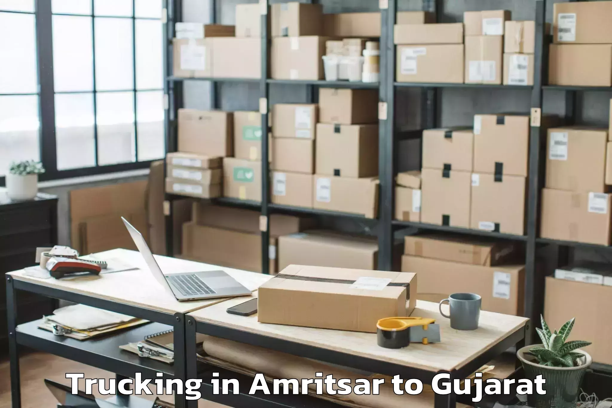 Easy Amritsar to Dwarka Trucking Booking